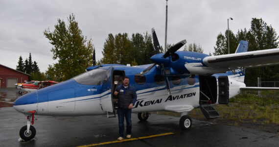 Joel Caldwell shows off the new Tecnam Traveller on Thursday, Sept. 15, 2022 in Kenai, Alaska. (Jake Dye/Peninsula Clarion)