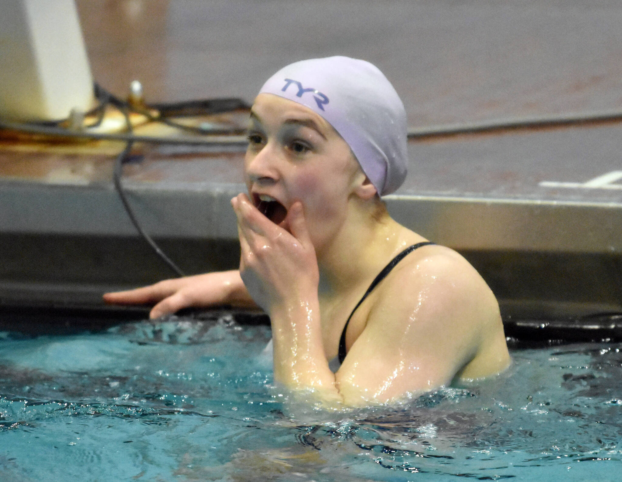 Soldotna’s Abriella Werner reacts to winning the diving competition Saturday, Oct. 28, 2023, at the Northern Lights Conference swim meet at Soldotna High School in Soldotna, Alaska. (Photo by Jeff Helminiak/Peninsula Clarion)