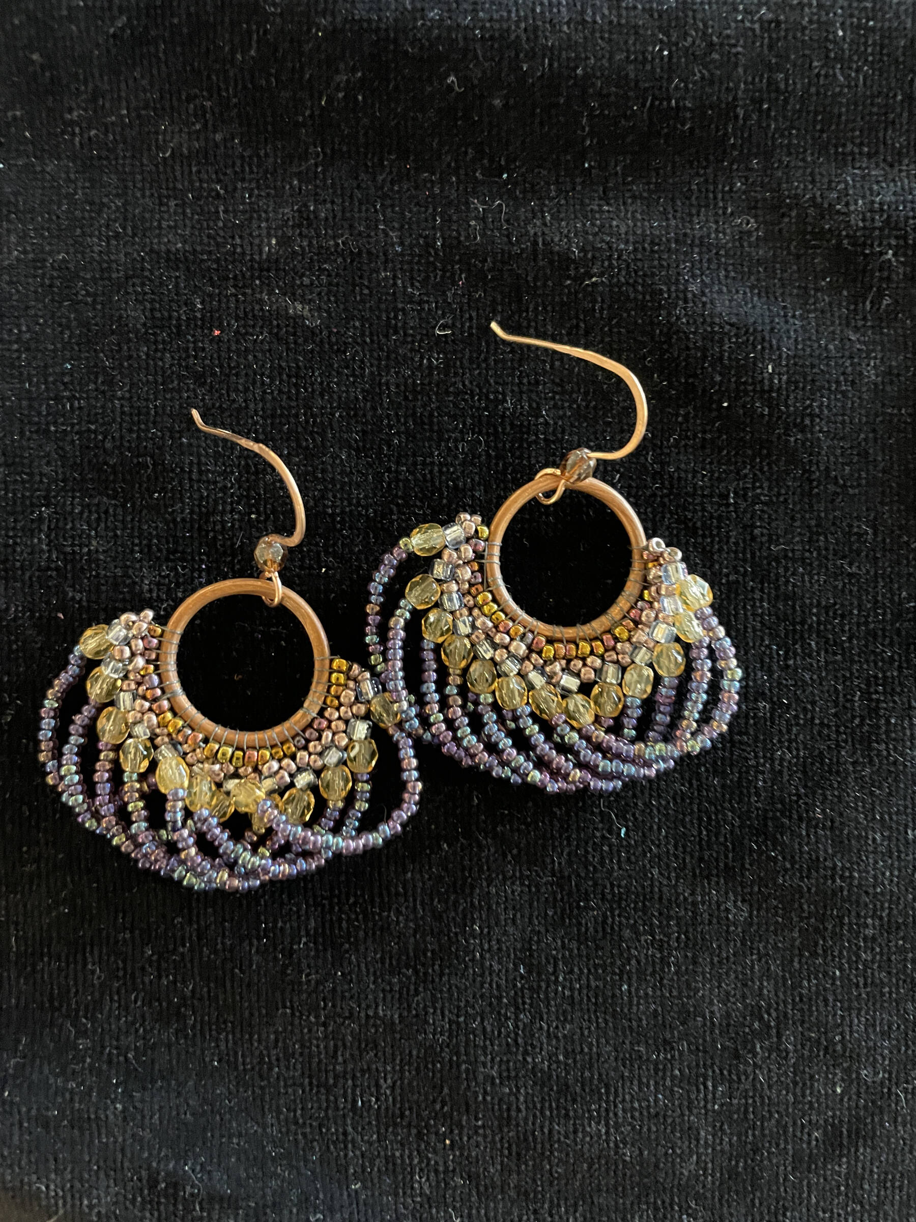 Beaded and metalwork earrings, created by Homer artist Cindy Nelson in the summer of 2023, are available at Ptarmigan Arts. Photo provided by Cindy Nelson