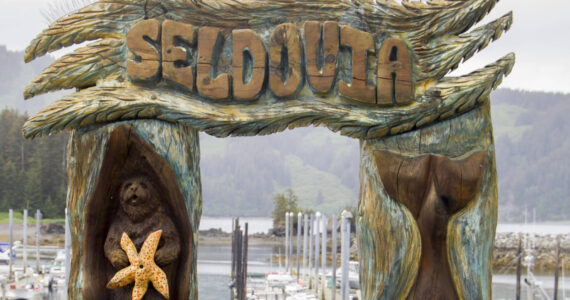 The Seldovia archway is one of the first landmarks visitors see when stepping off the boat. (Photo by Sarah Knapp/Homer News)
