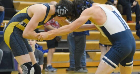 Homer's Bryce Hagge competes against Soldotna's Grady Abrams at 112 pounds at the Homer Round Robin Rumble on Saturday, Nov. 11, 2023, at Homer High School in Homer, Alaska. (Photo by Finn Heimbold/Homer News)