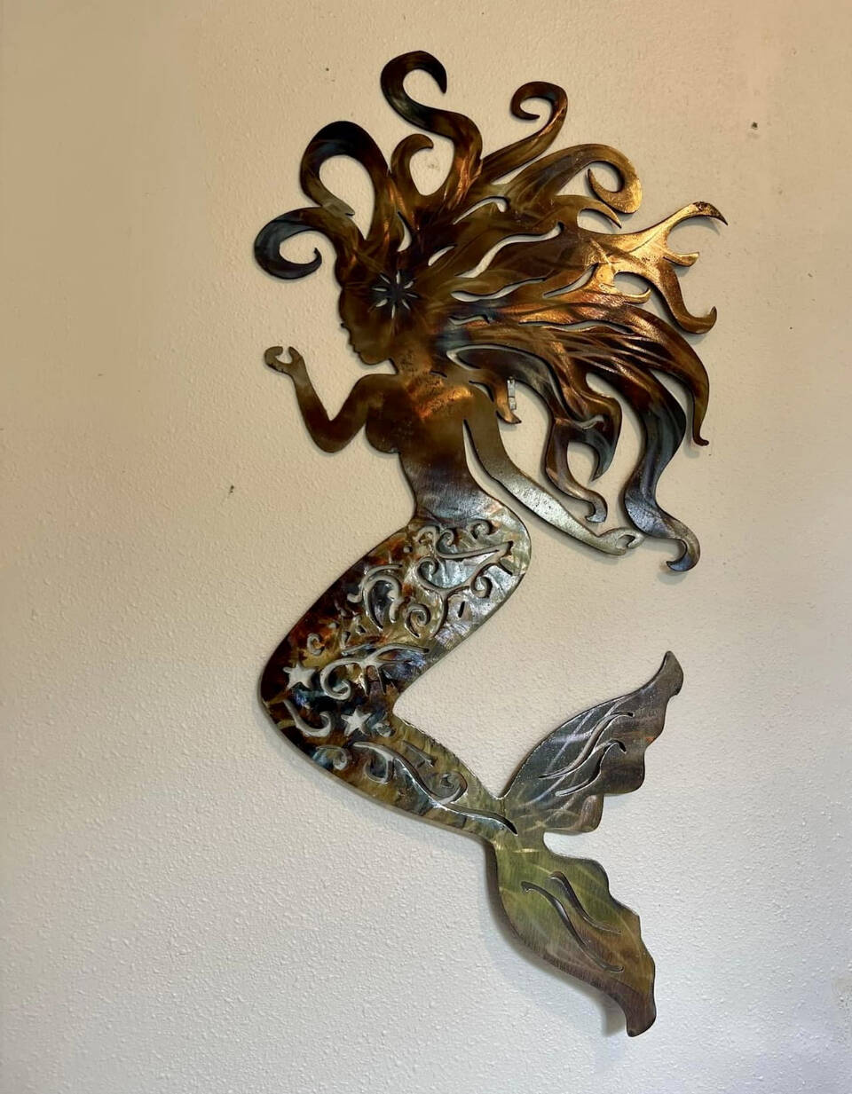A brushed and heat tempered metal mermaid by Homer artist Ellie DelliGatti is photographed this year. Photo provided by Ellie DelliGatti