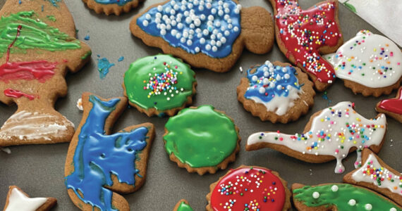 These festive gingerbread cookies are topped with royal icing and sprinkles. (Photo by Tressa Dale/Peninsula Clarion)