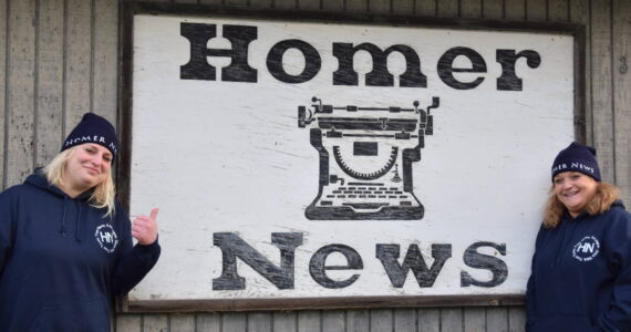 Homer News multimedia sales consultant Callie Steinberg and Peninsula Clarion regional sales manager Cara Hall pose outside the Homer News Office on Friday, Dec. 5, 2023.