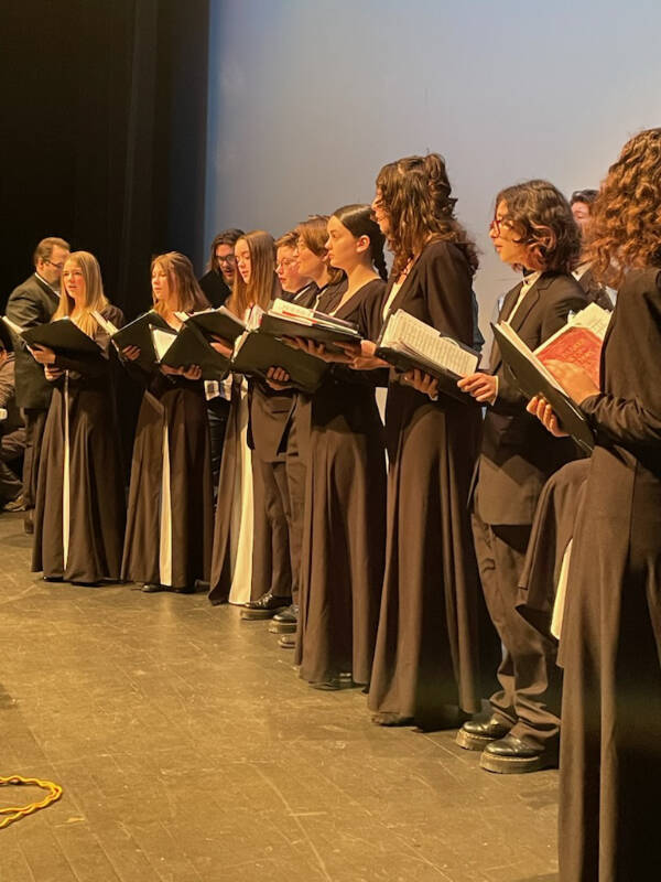 The Homer High School Swing Choir performs at their “Candlelight, Carols and Desserts” concert on Thursday, Dec. 14, 2023 at the Mariner Theatre in Homer, Alaska. (Emilie Springer/Homer News)