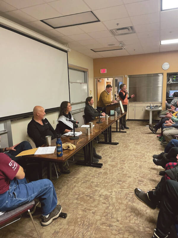 Kachemak Bay Campus programs coordinator Jill Burnham (far right) welcomes the audience to the Israel-Palestine conflict panel discussion on Friday, Dec. 15<ins>, 2023</ins> at Kachemak Bay Campus<ins> in Homer, Alaska</ins>. (Emilie Springer/Homer News)