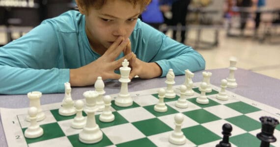 Photo provided by Andy Haas
Elijah Williams, 7th grade first place chess champion, at the chess tournament at West Homer Elementary on Monday.
