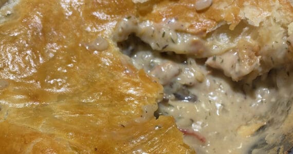 A creamy, rich and filling is ensconced a puff pastry crust in this French chicken and mushroom pie. (Photo by Tressa Dale/Peninsula Clarion)