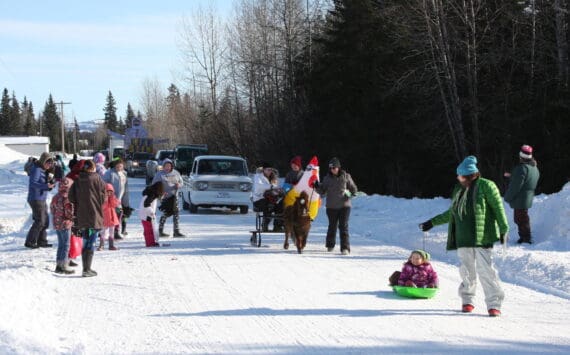 The Anchor Point Snow Rondi Parade proceeds down School Street on Saturday, March 4, 2023 in Anchor Point, Alaska. Photo by Delcenia Cosman