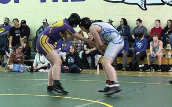 Photo provided by Tela Bacher
Homer Middle School’s Flora Fitzpatrick competes with a Kenai student at the borough wrestling tournament in Seward last weekend.