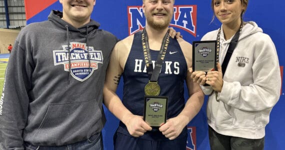 Dylan Dahlgren, Galen Brantley III and Adarra Hagelund at the NAIA Indoor Track and Field National Championships in Brookings, South Dakota. (Photo provided)