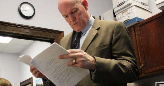 Bud Sexton, chief of staff for Alaska House Rep. Justin Ruffridge, reviews amendment language in their office at the Alaska State Capitol building on Wednesday, March 6, 2024, in Juneau, Alaska. (Ashlyn O’Hara/Peninsula Clarion)