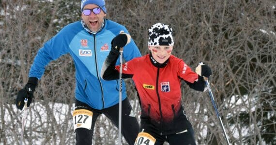 NIva Flagstad, 11, leads her father, Trond Flagstad, associate head coach for men's and women's Nordic skiing at the University of Alaska Anchorage, up a long climb in the Kachemak Ski Marathon just outside of Homer, Alaska, on Saturday, March 16, 2024. (Photo by Erin Thompson/Peninsula Clarion)
