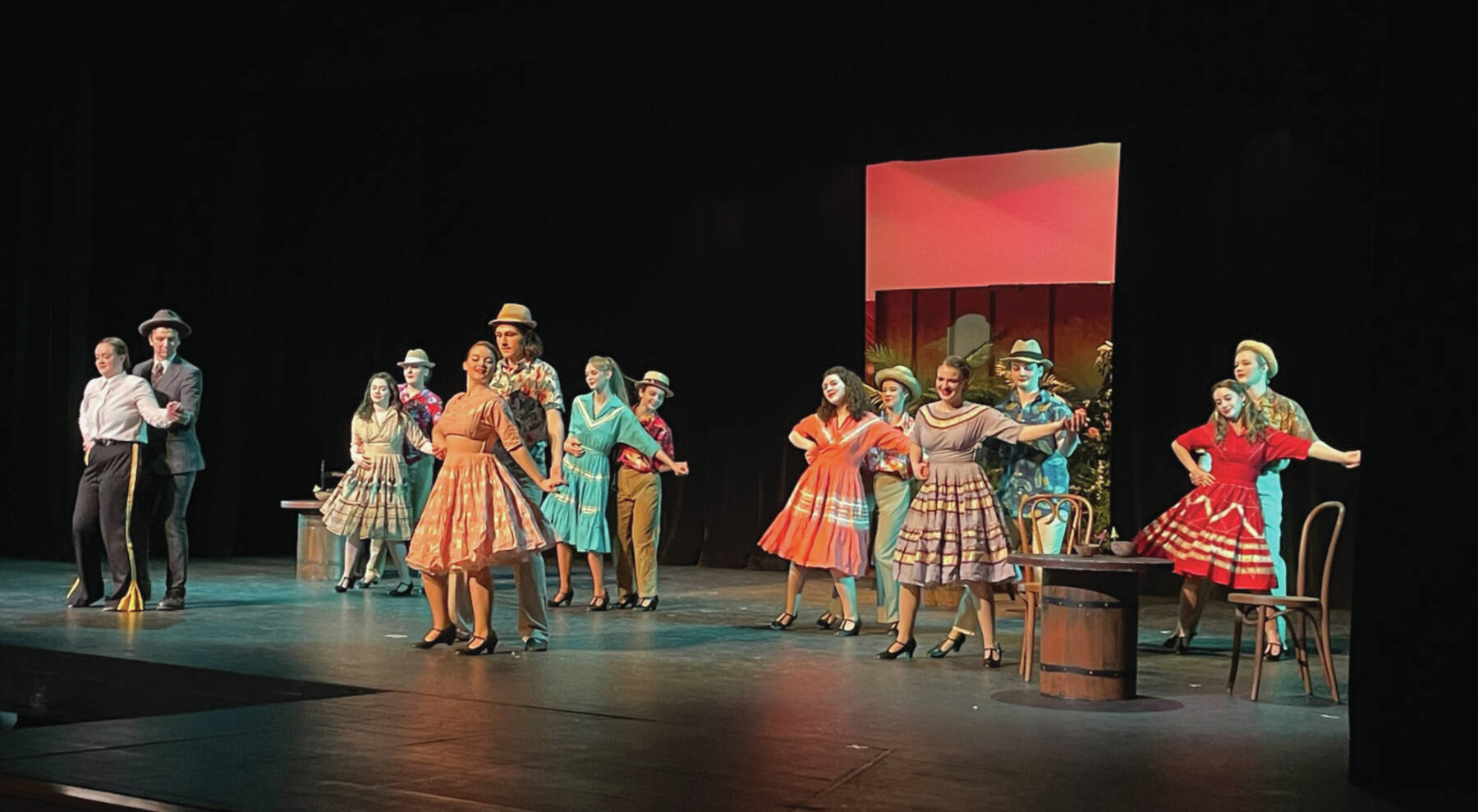 Dancers perform in the Havana scene of “Guys and Dolls” when character Sky Masterson, played by William Bradshaw, takes missionary Sarah Brown, played by Rebecca Trowbridge, to Cuba on a bet. (Photo by Emilie Springer/Homer News)