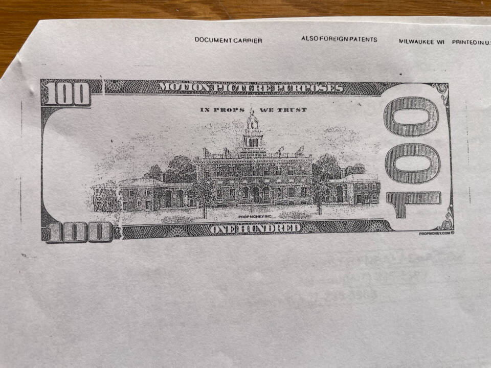 A counterfeit bill was received by the First National Bank on Thursday, March 28, 2024 in Homer, Alaska. (Emilie Springer/Homer News)