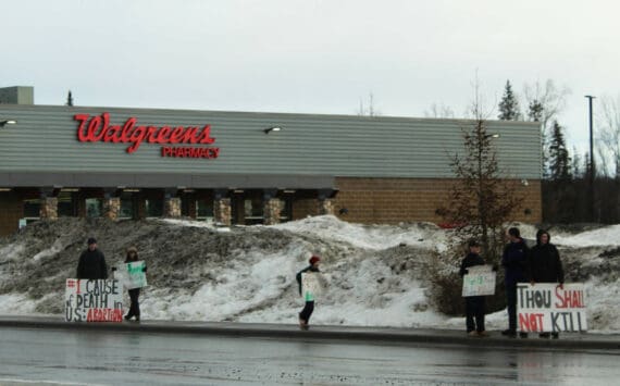 Demonstrators protest the sale of mifepristone outside of Walgreens in Soldotna on Tuesday, March 27, 2024 in Soldotna, Alaska. (Ashlyn O'Hara/Peninsula Clarion)