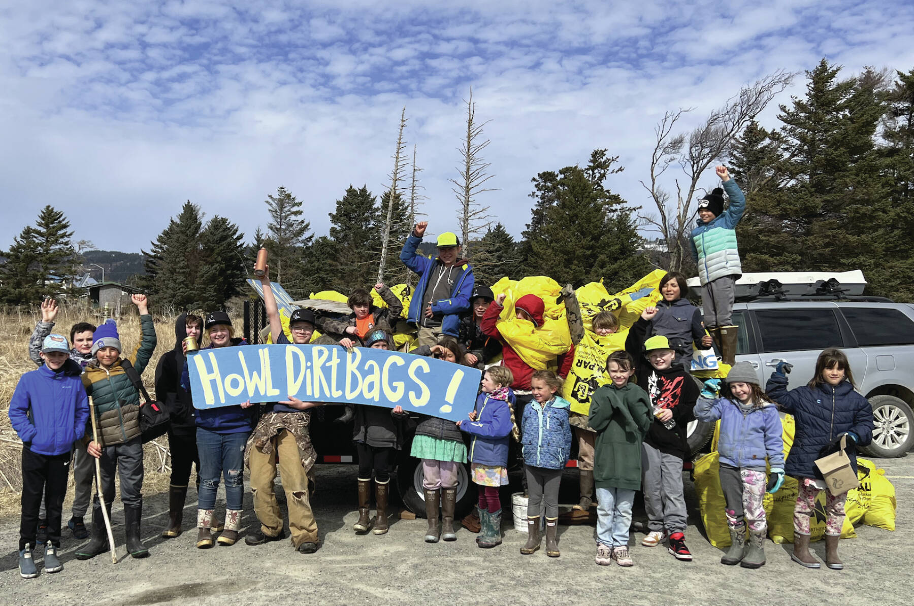 2023 dirtbag participants in front of their trash collection at Bishops Beach in Homer. (Photo provided by HoWL)