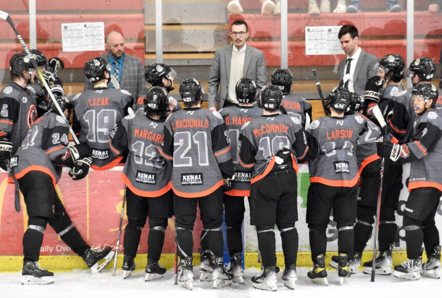 <p>Head coach Taylor Shaw (center) talks to the Kenai River Brown Bears during a timeout at the Soldotna Regional Sports Complex in Soldotna, Alaska, on Saturday, March 23, 2024. (Photo by Jeff Helminiak/Peninsula Clarion)</p>