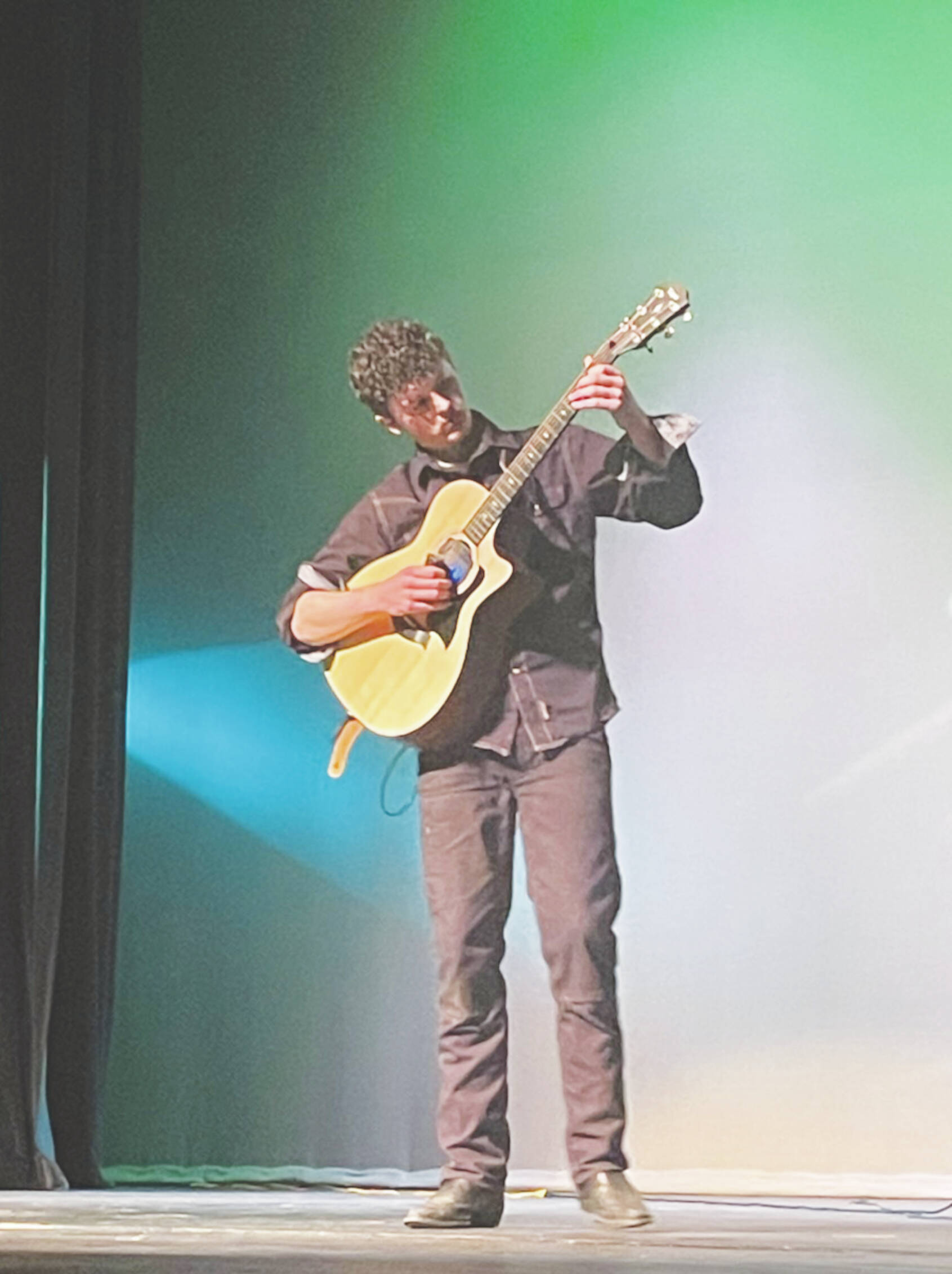 Silas Jones completes the Jubilee! evening of talent events at the Mariner Theatre last Friday<ins>, April 19, in Homer, Alaska</ins>. Photo by Emilie Springer.