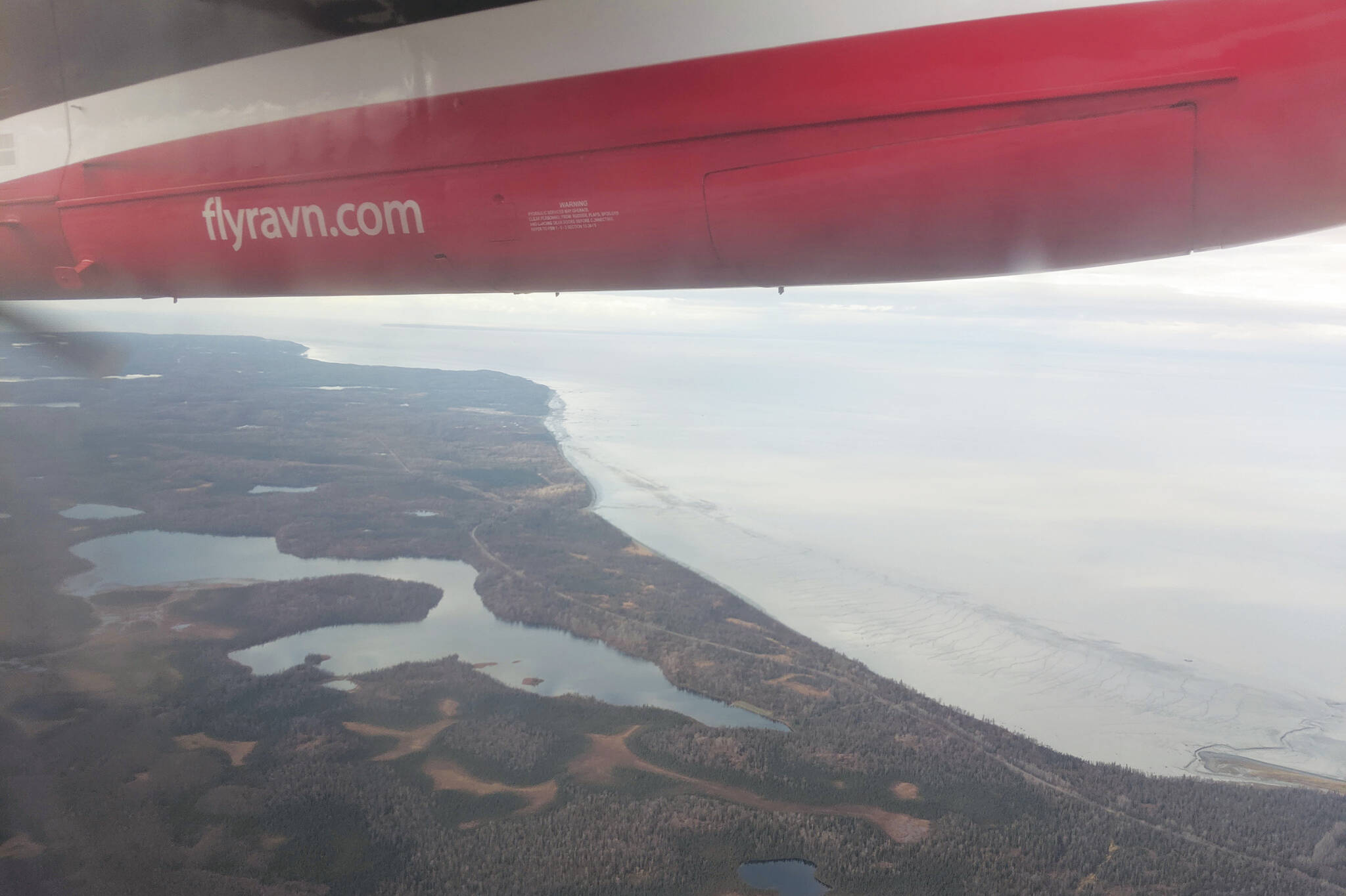 Cook Inlet can be seen through the window of a Ravn aircraft in October 2019. (Photo by Erin Thompson/Peninsula Clarion)
Cook Inlet can be seen through the window of a Ravn aircraft in October 2019. (Photo by Erin Thompson/Peninsula Clarion)