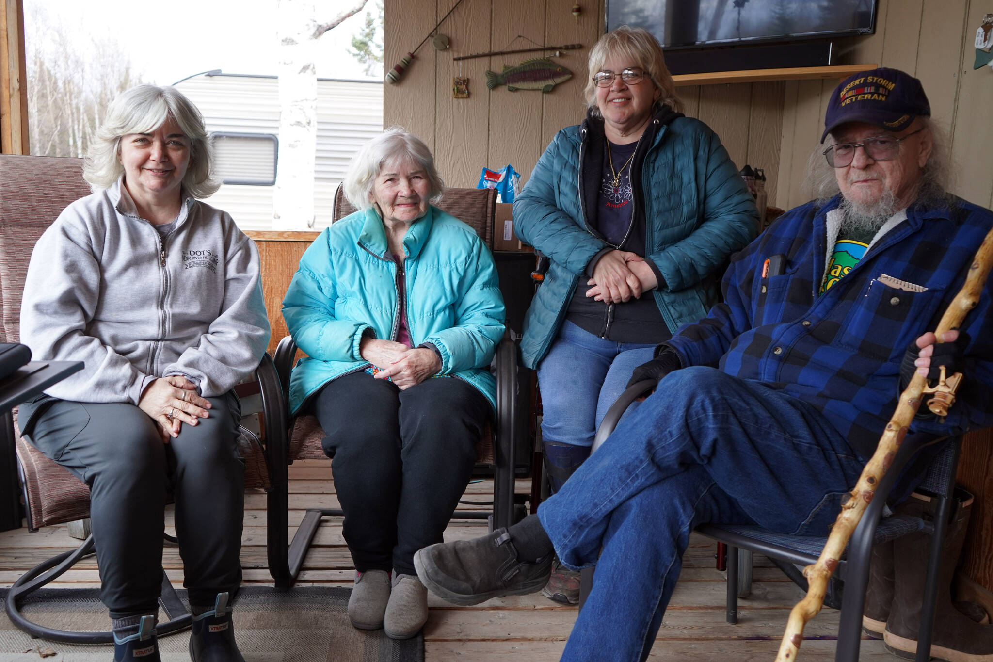 From left: Donna Anderson, Betty Stephenson, Sue Stephenson and Eddie Thomas gather for a photo at Dot’s Kenai River Fish Camp in Sterling, Alaska, on Saturday, May 4, 2024. (Jake Dye/Peninsula Clarion)