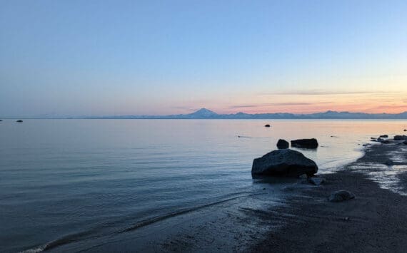 Mount Redoubt can be seen across Cook Inlet from North Kenai Beach on Thursday, July 2, 2022. (Erin Thompson/Peninsula Clarion file photo)