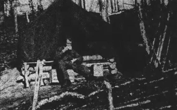 While sitting in front of the wall-tent home he shared from several months with Ira Little, Soldotna homesteader enjoys a cup of coffee and a brief respite from cabin building. (Image from the Wayne Herald, of Nebraska, on March 10, 1949)