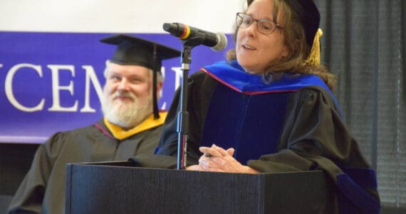 Kenai Peninsula College Director Cheryl Siemers speaks to graduates during the 55th commencement ceremony at Kachemak Bay Campus on Wednesday, May 7, 2025, in Homer, Alaska. (Delcenia Cosman/Homer News)