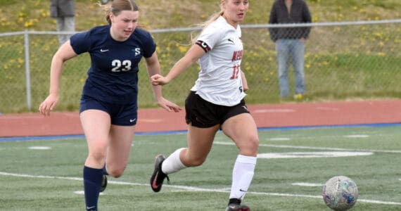 Soldotna’s Jillian Duncan and Kenai Central’s Kate Wisnewski battle for the ball Thursday, May 22, 2025, at Justin Maile Field at Soldotna High School in Soldotna, Alaska. (Photo by Jeff Helminiak/Peninsula Clarion)