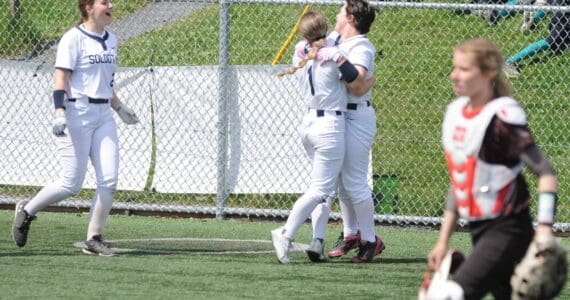 DEREK CLARKSTON/Kodiak Daily Mirror
Soldotna players celebrate a walk-off 10-9 win over Kenai in the final of the playback bracket at the Northern Lights Conference softball tournament Saturday, May 31, 2025, at Baranof Field in Kodiak, Alaska. (Photo by Derek Clarkston/Kodiak Daily Mirror)