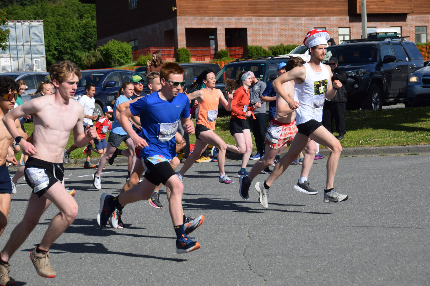 Runners start from Homer High School during the Homer Spit Run 10K to the Bay on Saturday, June 28, 2025, in Homer, Alaska. (Delcenia Cosman/Homer News)