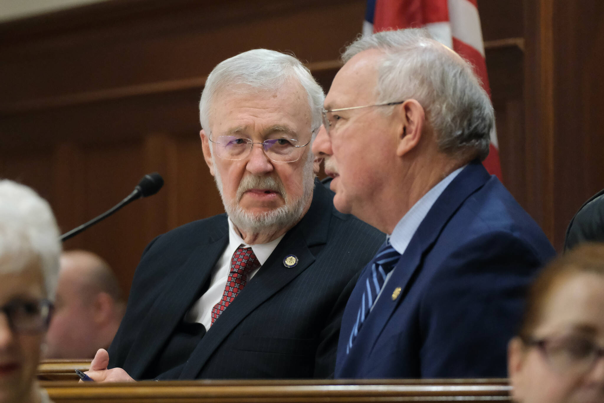 Alaska Senate President Gary Stevens, a Kodiak Republican, left, talks with House Speaker Bryce Edgmon, a Dillingham independent, before Republican Gov. Mike Dunleavy’s State of the State speech on Tuesday, Jan. 28, 2025, at the Alaska State Capitol. (Klas Stolpe/Juneau Empire)
