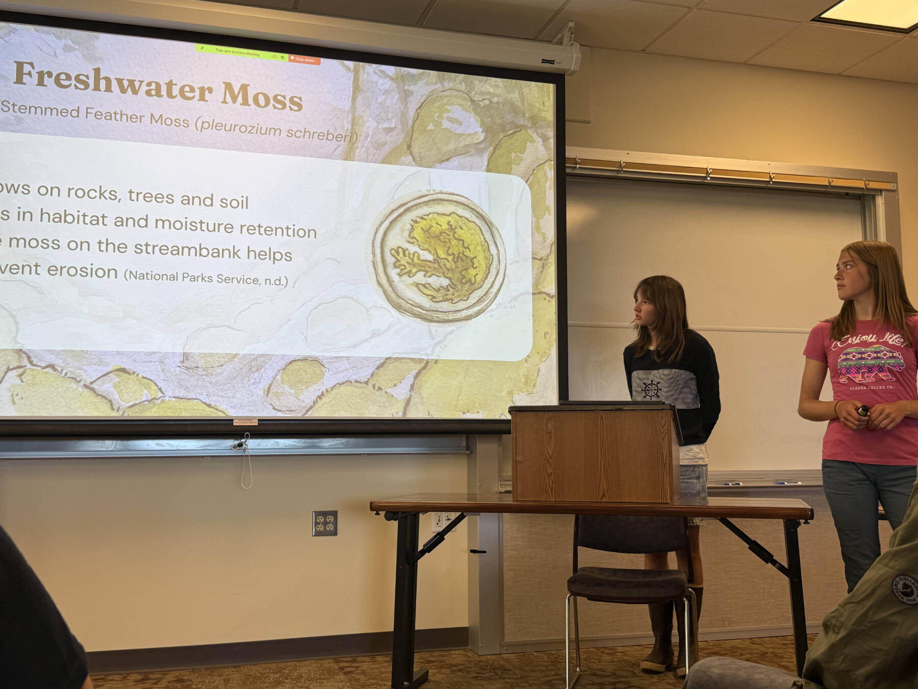 Team Moss presents their research on July 28 in Pioneer Hall at Kachemak Bay Campus. (Chloe Pleznac/Homer News)