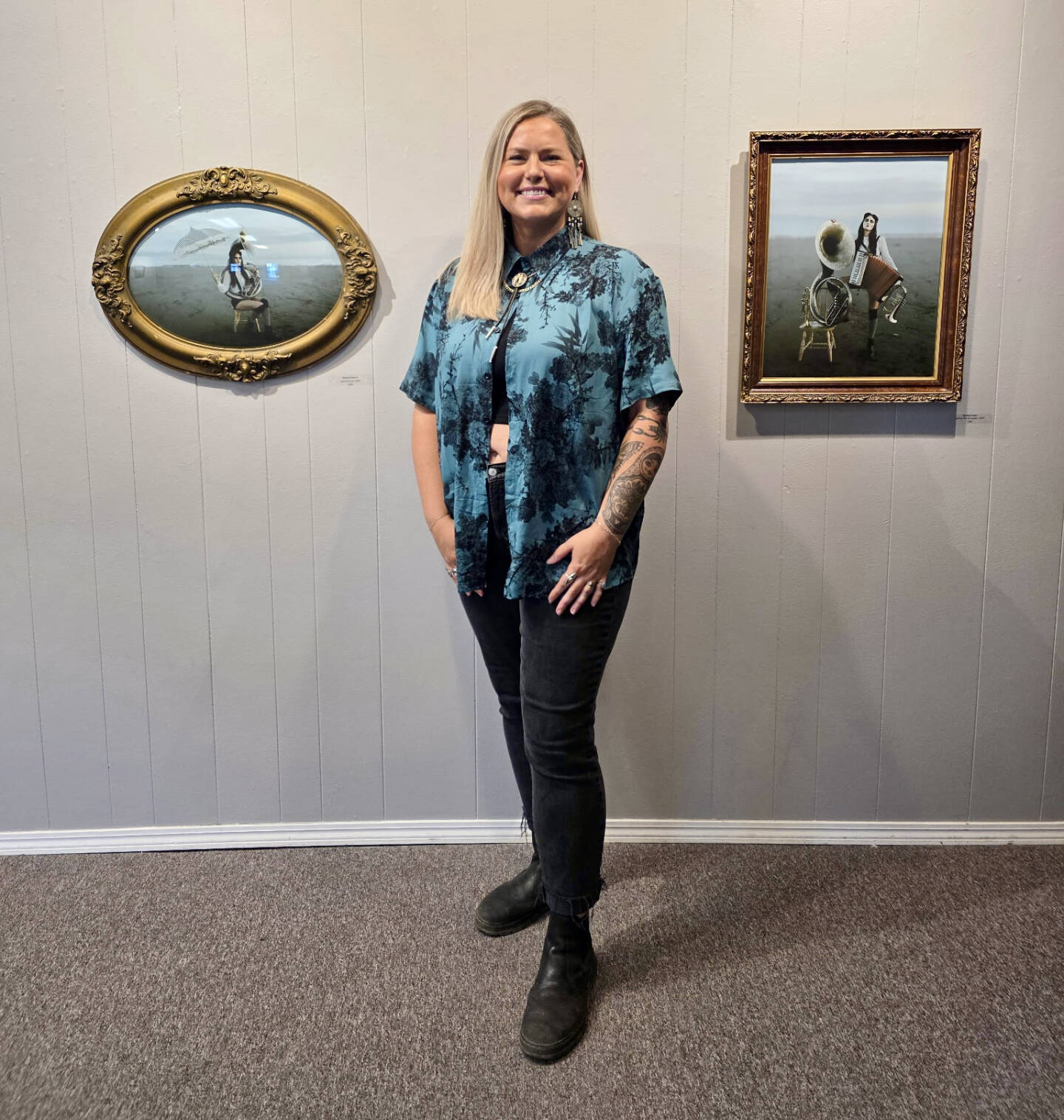 Homer photographer Amaia Nicole Crain poses with her art during her First Friday photography exhibit opening on Aug. 1, 2025, at Homer Council on the Arts in Homer, Alaska. Photo provided by Amaia Nicole Crain