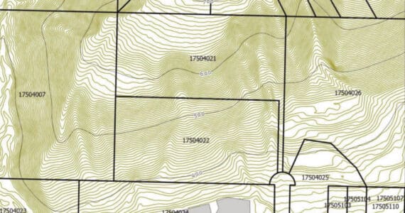 A map from a South Kenai Peninsula Hospital Service Area Board resolution in support of the land buy ordinance shows the location of South Peninsula Hospital in regard to the steep slopes surrounding the property. Parcel #17504022 is one of the four properties assembly members unanimously voted to purchase on Tuesday, Aug. 19.