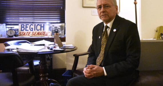 Former Sen. Tom Begich, D-Anchorage, speaks with the Juneau Empire in his office at the Alaska State Capitol on Tuesday, April 12, 2022. (Peter Segall / Juneau Empire file photo)