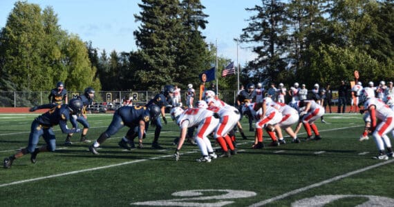 The Homer Mariners varsity football team faces the Kenai Central High School Kardinals on Friday, Aug. 29, 2025, at the Homer High School football field in Homer, Alaska. (Delcenia Cosman/Homer News)