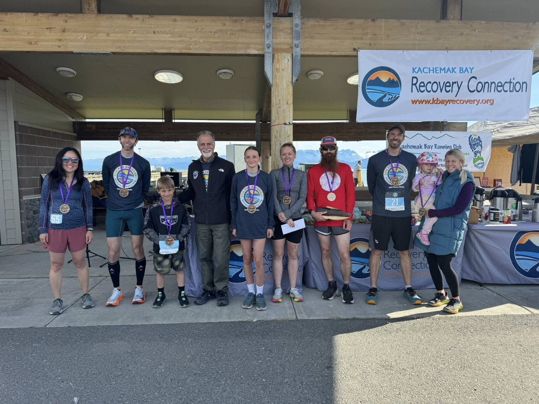 Top finishers of the 3rd annual Run for Recovery pose with Borough Mayor, Peter Micciche, on Saturday, Aug. 30, 2025, at the Homer Deep Water Dock. (Photo courtesy of Kachemak Bay Recovery Connection)