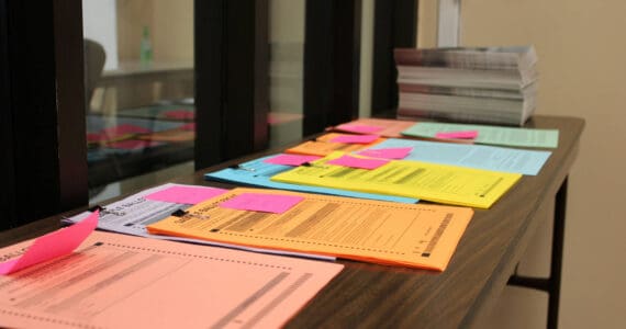 Sample ballots are displayed in Kenai City Hall on Thursday, Sept. 29, 2022 in Kenai, Alaska. (Ashlyn O’Hara/Peninsula Clarion)