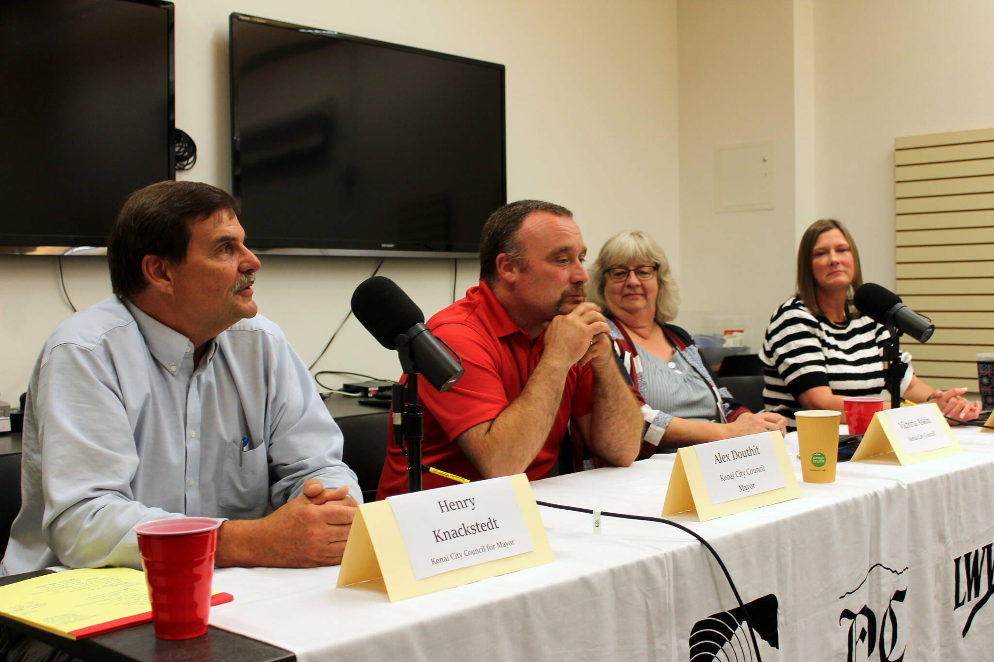 Henry Knackstedt, Alex Douthit, Victoria Askin and Bridget Grieme participate in a forum with candidates for Kenai mayor and city council at the Kenai Community Library in Kenai, Alaska, on Thursday, Sept. 4, 2025. (Jake Dye/Peninsula Clarion)