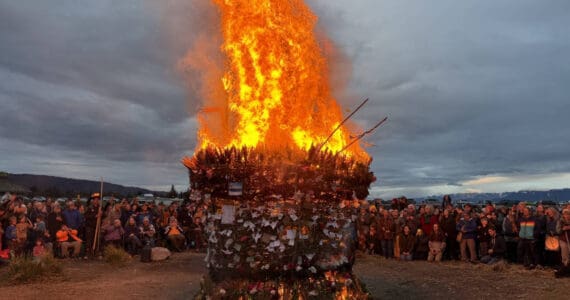 The basket catches fire on Sunday, Sept. 7, 2025 at Mariner Park in Homer, Alaska. (Chloe Pleznac/Homer News)