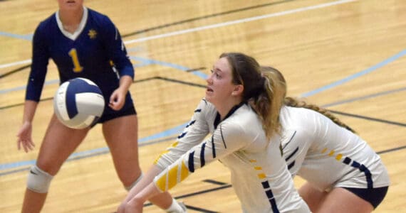 Homer’s Reilly Sue Baker digs up a ball against Soldotna on Tuesday, Sept. 9, 2025, at Soldotna High School in Soldotna, Alaska. (Photo by Jeff Helminiak/Peninsula Clarion)