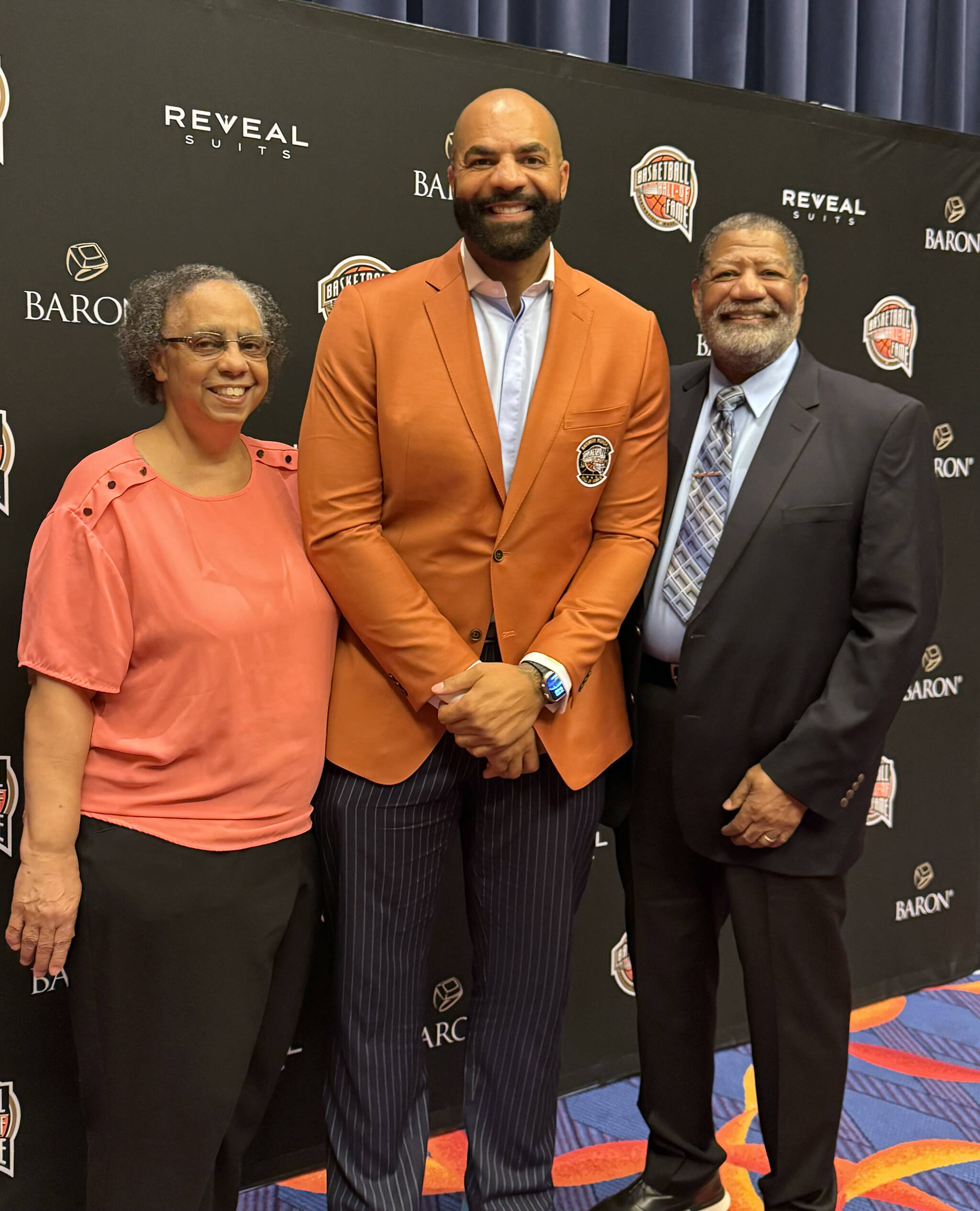 Renee Boozer, Carlos Boozer Jr. and Carlos Boozer Sr. attend the enshrinement ceremony at the Naismith Basketball Hall of Fame in Springfield, Massachusetts, on Saturday, Sept. 6, 2025. As a member of the 2008 U.S. mens Olympic team, Boozer Jr. is a member of the 2025 class. (Photo provided by Carlos Boozer Sr.)