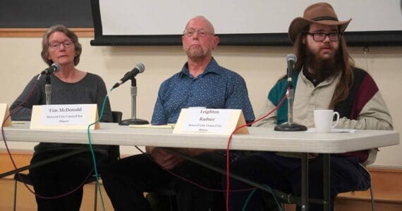 Incumbent Sue McClure and challengers Tim McDonald and Leighton Radner, the three candidates for Seward mayor, participate in a forum at the Seward Community Library in Seward, Alaska, on Thursday, Sept. 11, 2025. (Jake Dye/Peninsula Clarion)