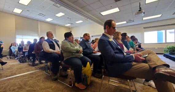 Kachemak Bay Writers’ Conference attendees fill the room in Kachemak Bay Campus’s Pioneer Hall during the opening panel on Saturday, May 18, 2024 in Homer, Alaska. (Delcenia Cosman/Homer News)