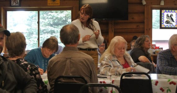 Kenai Peninsula Borough Special Projects and Constituent Relations coordinator Dana Cannava (center) talks through proposals for community projects during a meeting held Saturday, Sept. 27, 2025, at the Anchor Point Community and Senior Center in Anchor Point, Alaska. (Delcenia Cosman/Homer News)