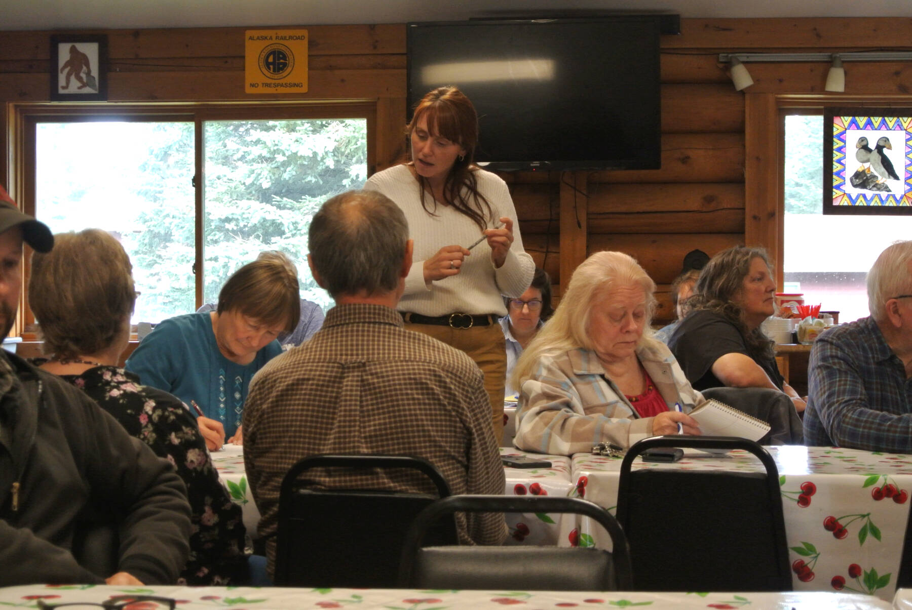 Kenai Peninsula Borough Special Projects and Constituent Relations coordinator Dana Cannava (center) talks through proposals for community projects during a meeting held Saturday, Sept. 27, 2025, at the Anchor Point Community and Senior Center in Anchor Point, Alaska. (Delcenia Cosman/Homer News)