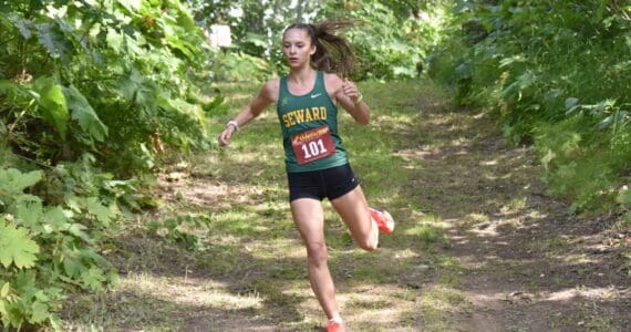 Seward's Olive Jordan runs to victory in the freshmen-sophomore girls race at the Kenai/Nikiski Class Races on Monday, Aug. 18, 2025, at Nikiski Middle-High School in Nikiski, Alaska. (Photo by Jeff Helminiak/Peninsula Clarion)