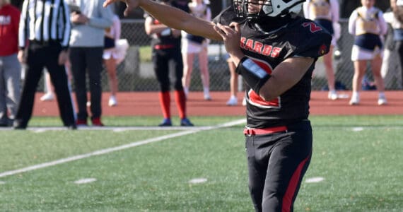 Kenai Central’s Garrett McCanna throws a pass against Homer on Saturday, Sept. 27, 2025, at Ed Hollier Field at Kenai Central High School in Kenai, Alaska. (Photo by Jeff Helminiak/Peninsula Clarion)