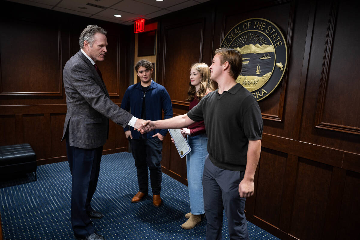 Alaska Governor Mike Dunleavy meets with members of the University of Alaska Anchorage chapter of Turning Point on Tuesday, Oct. 14, 2025, the same day he proclaimed “Charlie Kirk Day.” (Governor Mike Dunleavy/Facebook)